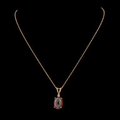 Pre-Owned Garnet & Diamond Pendant in 14K