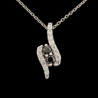 Pre-Owned Black Diamond & White Diamond Pendant in 14K