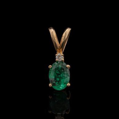 Pre-Owned Emerald & Diamond Pendant in 10K