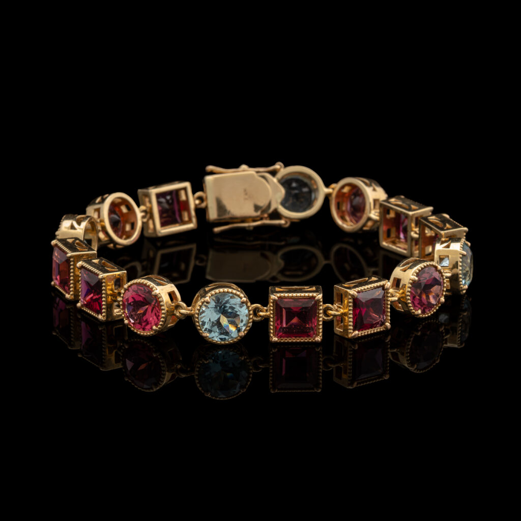 Pre-Owned Garnet & Aquamarine Bracelet in 14K