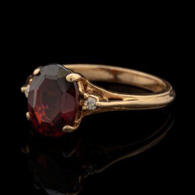 Pre-Owned Garnet & Diamond Ring in 14K