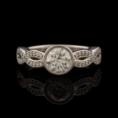 Pre-Owned Diamond Ring Bezel Set in Platinum