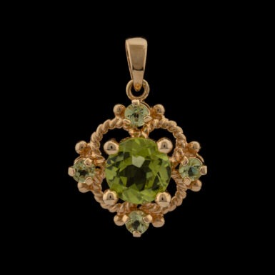 Pre-Owned Peridot Pendant in 14K