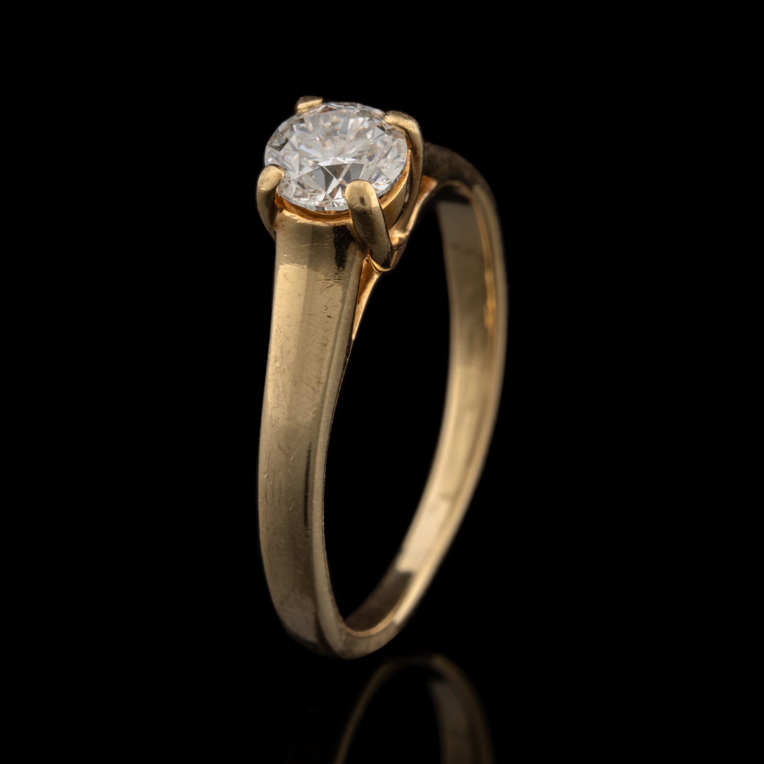 Pre-Owned .47 Carat tw Diamond Solitaire Ring in 18K