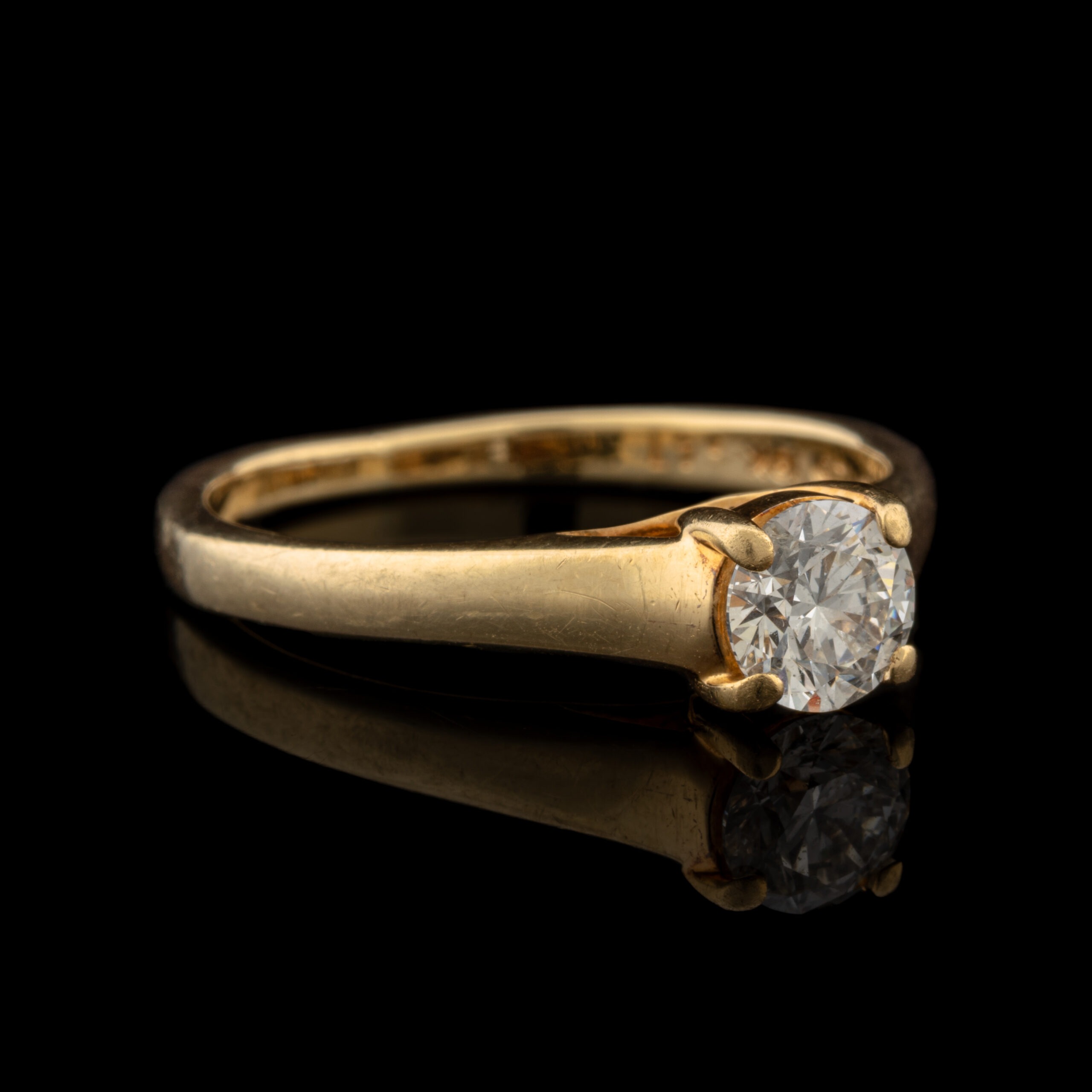 Pre-Owned .47 Carat tw Diamond Solitaire Ring in 18K