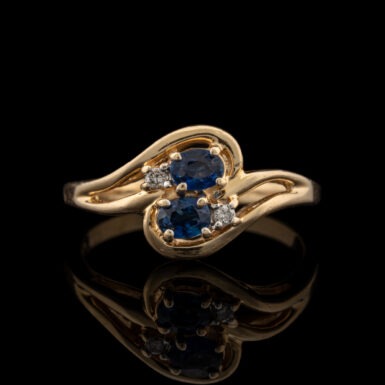 Pre-Owned Sapphire & Diamond Bypass Ring in 14K