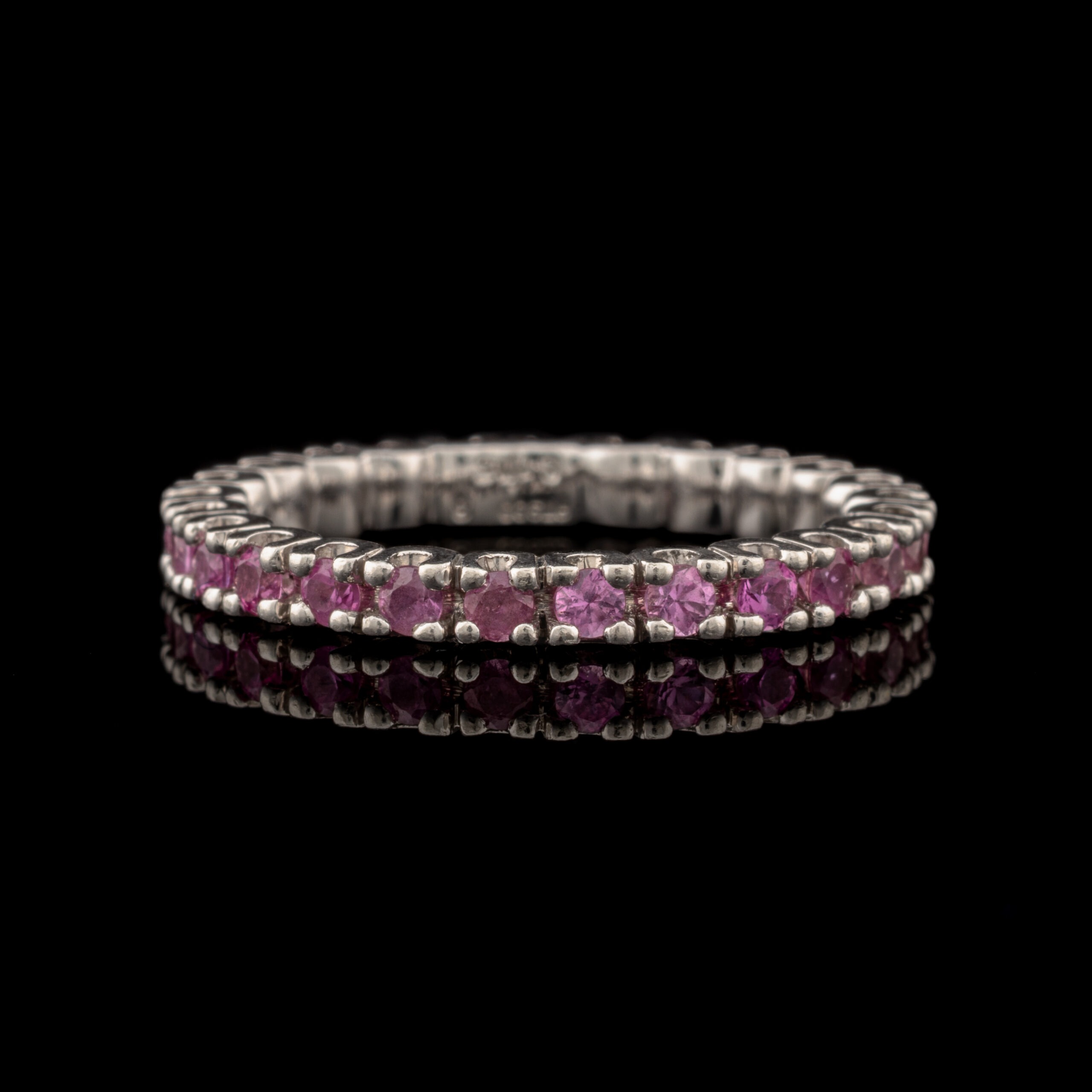 Pre-Owned Eternity Pink Sapphire Band in Platinum